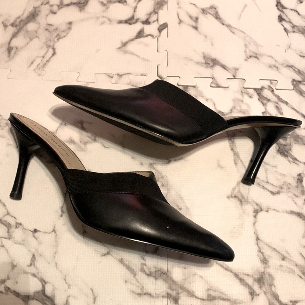 Black leather slip on heels.